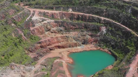 wide shot of open pit nam salu geosite at belitung, aerial