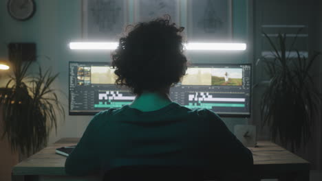 person editing video at home