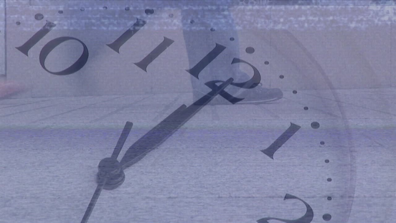 Animation of clock over walking people walking on the street