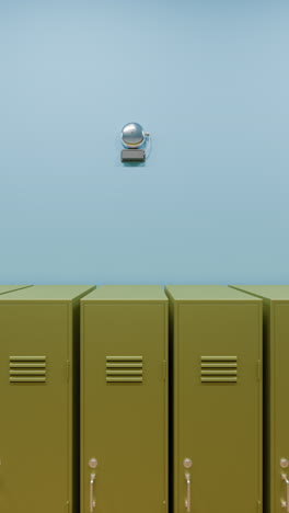 back to school ringing grey bell with yellow lockers in the corridor