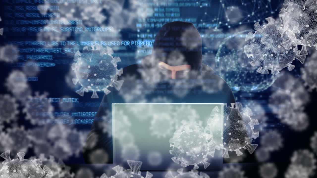 노트북을 사용하여 발라클라바를 입은 남성에 대한 거대한 코로나19 세포의 애니메이션
