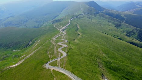 aerial drone footage of a romanian mountain road – transalpina