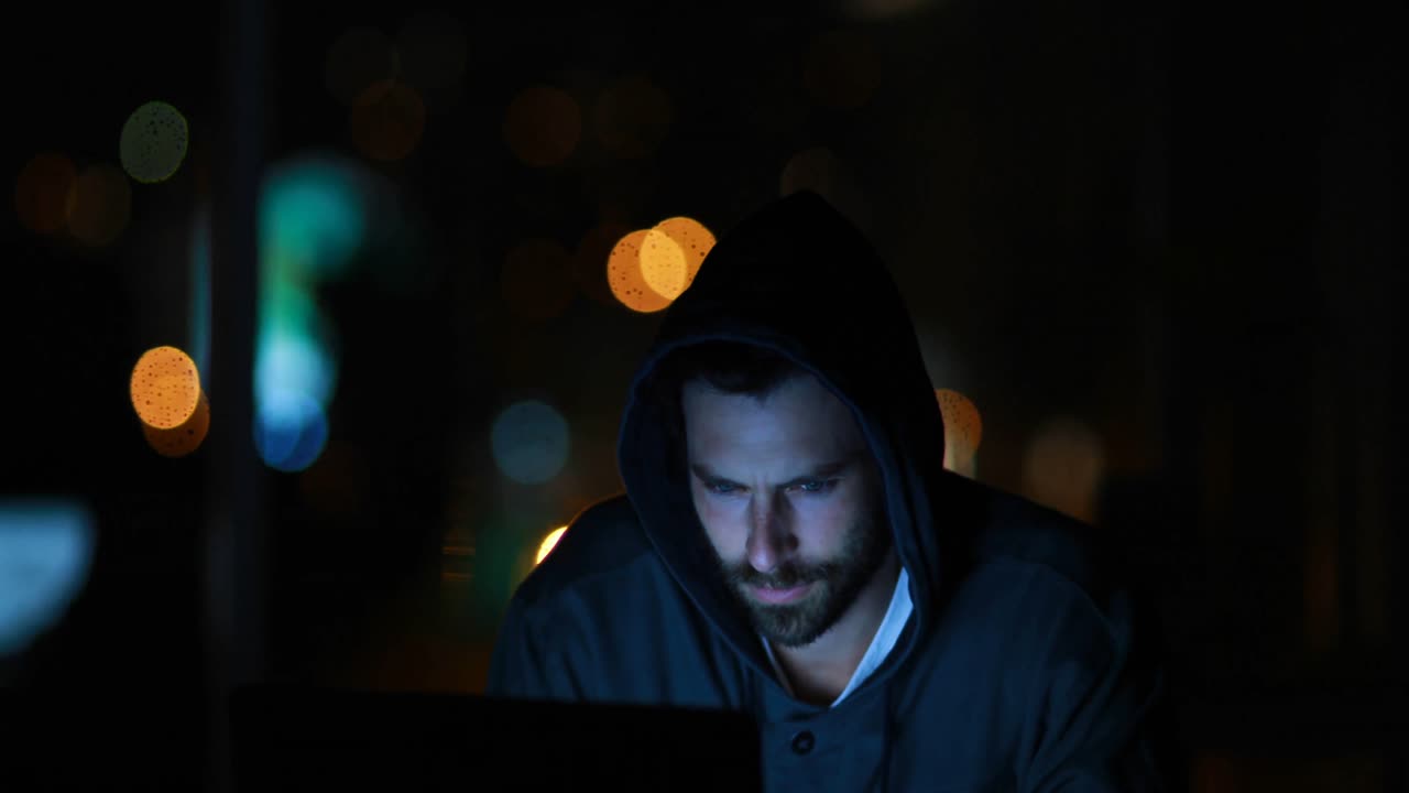 Hacker hacking a laptop