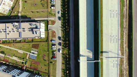 Drone-shot-highway-motorway-showing-lanes-with-Tunnel-and-viaducts-outside-the-city-of-Warsaw,-Poland