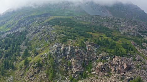 Drone orbits around rocks at grossglockner high alpine road, 4k