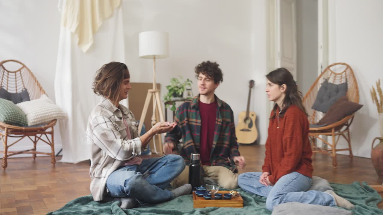 Friends Enjoying a Cozy Tea Ceremony at Home