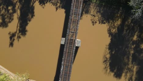 Overhead spiral shot of railroad track bridge in Clarksville Tennessee