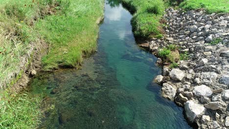 Aerial-footage-flying-over-a-creek-in-Texas