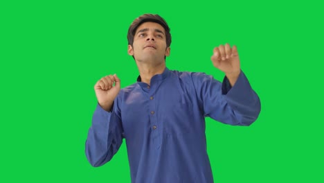 Happy-Indian-man-dancing-and-enjoying-Green-screen