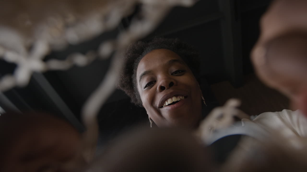 Woman looking down from inside an object