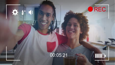 animation of white frame over happy diverse friends drinking beer