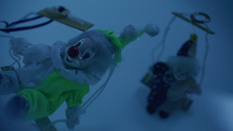 two hanging clowns