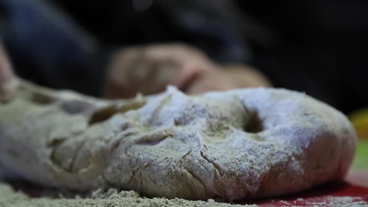 Woman kneading to make bread