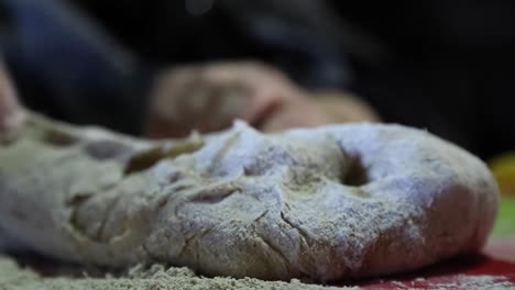 woman kneading to make bread