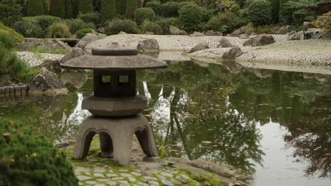 cinemagraph of japanese garden with stone altar for kami-spirits of nature