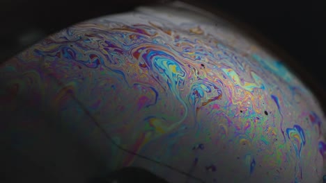 vibrant colorful sci-fi planet atmosphere. abstract soap bubble texture pattern. unreal dream.
