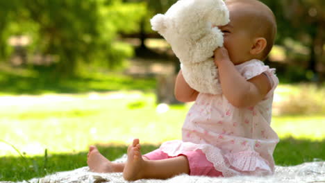 happy baby laughing in the park