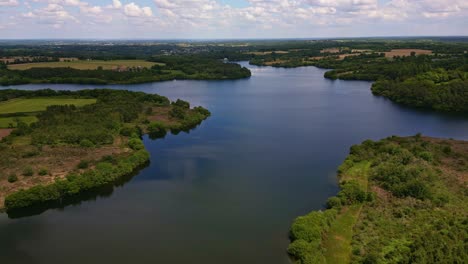 Aerial-view-about-Roca-lake-and-its-natural-environment,-Saint-Thurial,-France