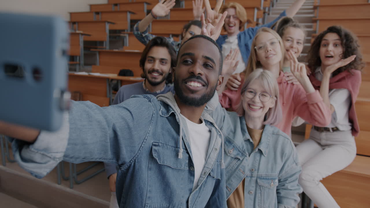 Happy Students Taking a Selfie in a Classroom