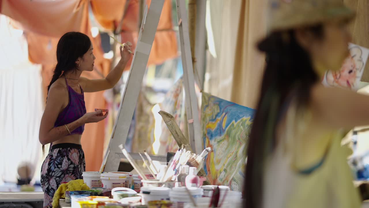 Artists Painting Outdoors at a Festival