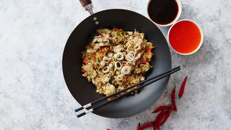 delicious fried rice with chicken in wok