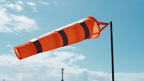 windsock with blue sky on background