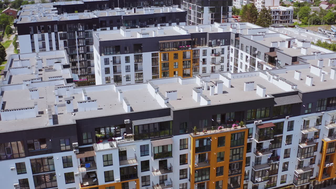 Facade of new residential complex. Aerial view of typical multi level apartment building