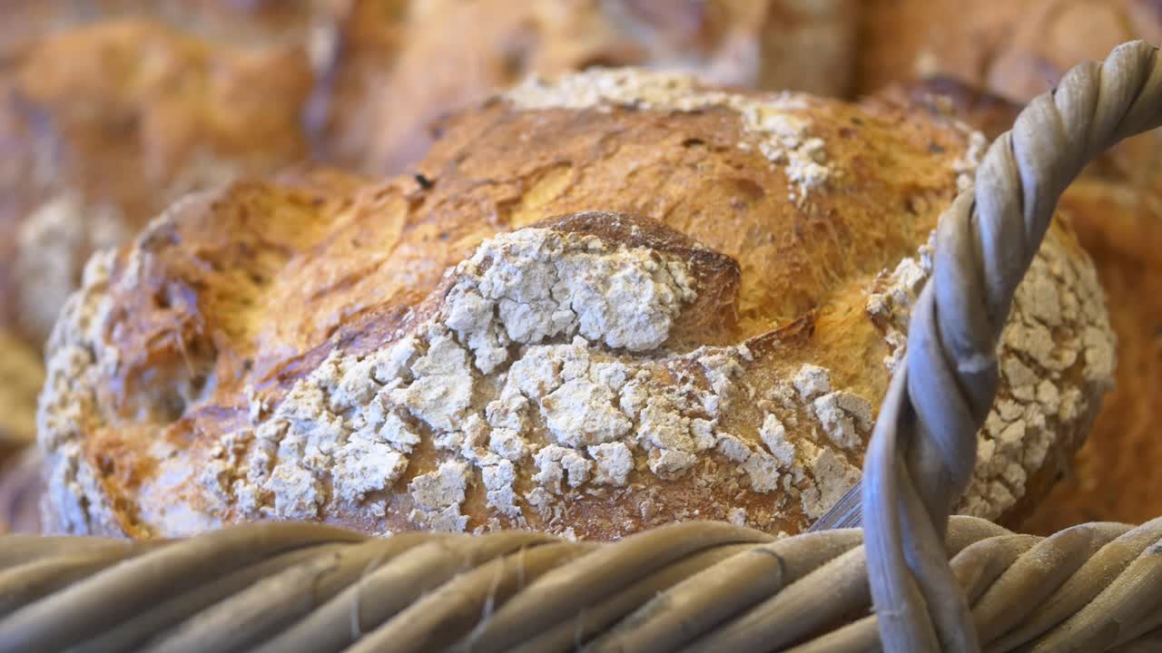 Close up of a fresh loaf of bread in a basket