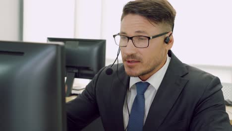 business people wearing headset working in office