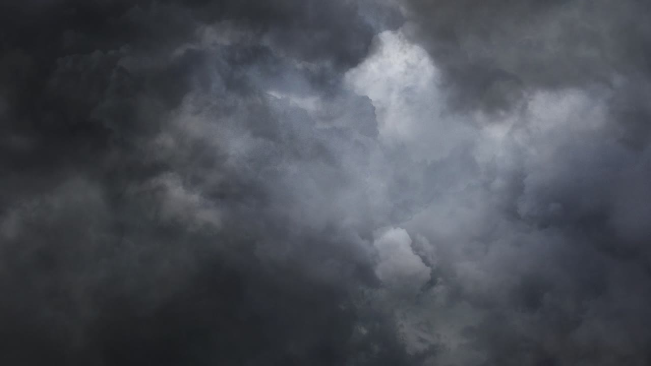 view of striking lightning bolts in dark clouds