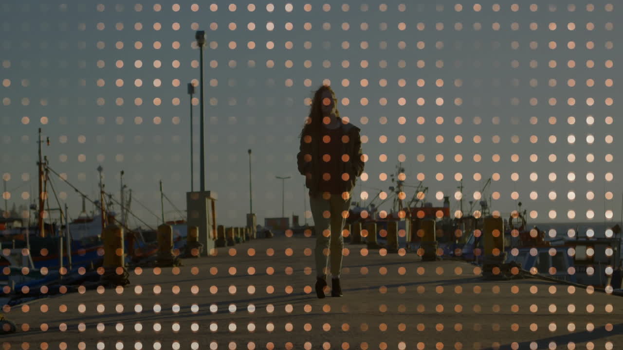 woman walking along fishing boats on harbor pier for tourism campaign, with animated location pins