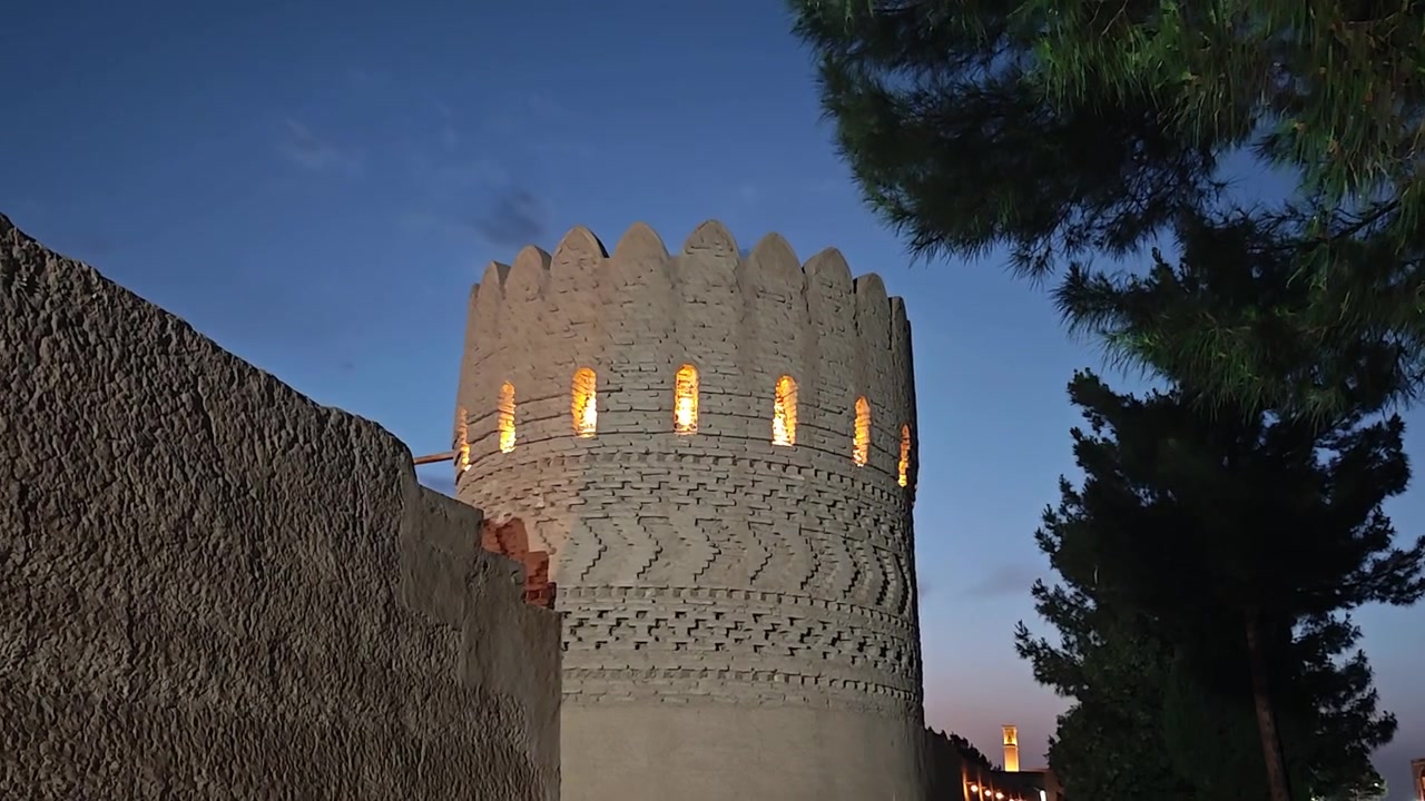 Ancient Brick Watchtower Illuminated at Twilight