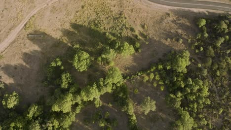 Slow-aerial-view-over-rural-road-in-Spanish-countryside