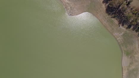 Aerial-top-down-shot-of-the-drying-lake-of-Pozzillo,-Sicily,-Italy-showing-the-problems-with-drought