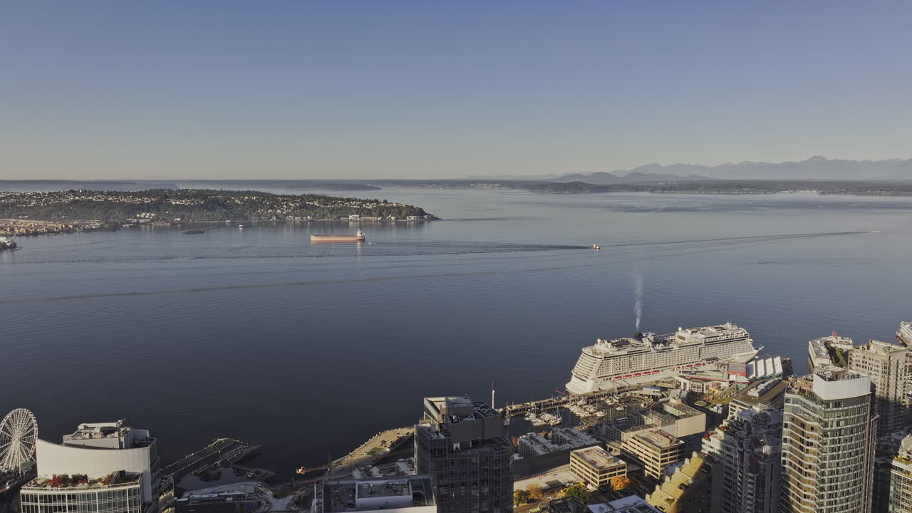 Seattle Washington Aerial v209 flyover downtown capturing cruise ship docked at the pier along Elliott Bay and serene views of Puget Sound in the morning - Shot with Mavic 3 Pro Cine - Oct 7th 2023