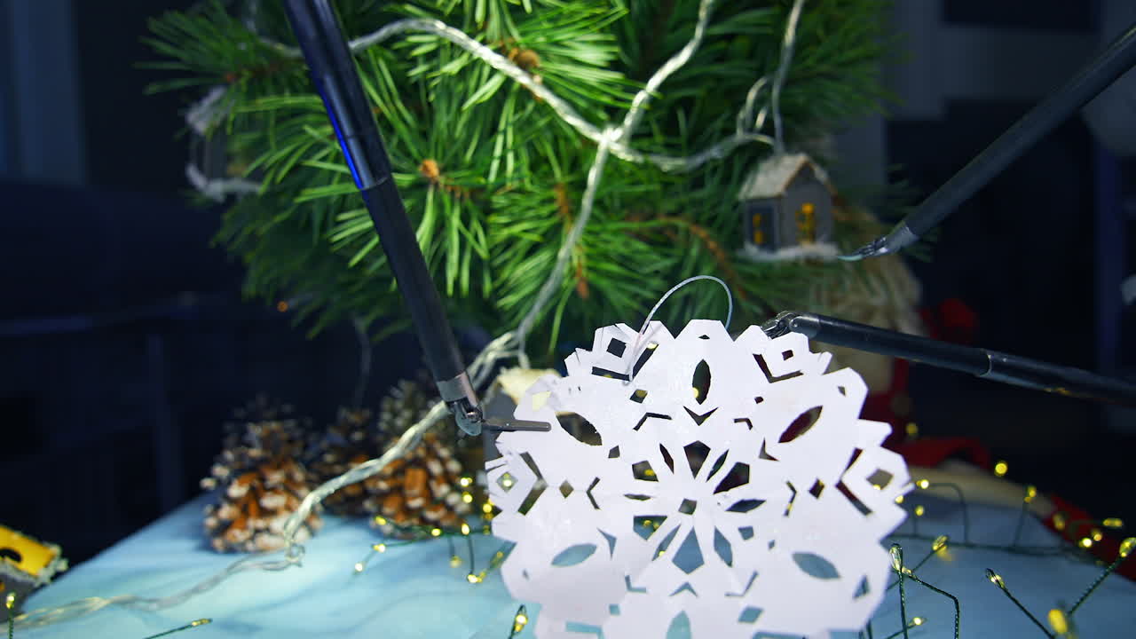 Gadget humanoid decorating Christmas tree. Artificial intelligence machine preparing paper snowflake for winter holidays. Robotic industry concept.