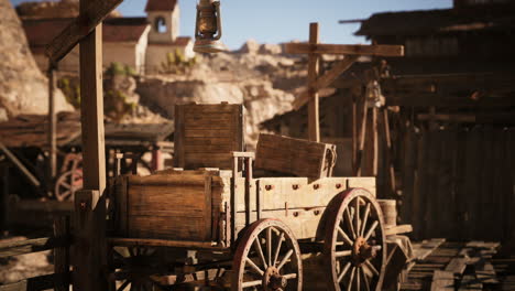 old wooden cart filled with crates in a rugged western mining town setting