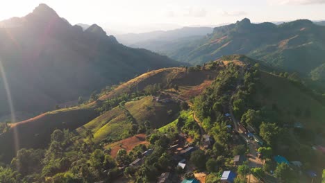 drone above northern thailand mae hong son province stunning mountain landscape at sunset aerial footage small isolated road famous motorcycle loop travel destination