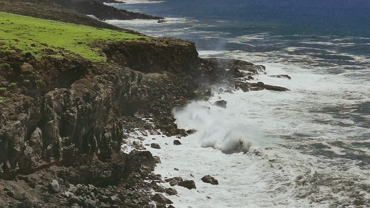 Coastal Waves Crashing on Rocky Shore