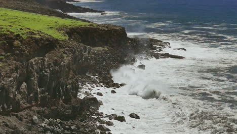 coastal waves crashing on rocky shore