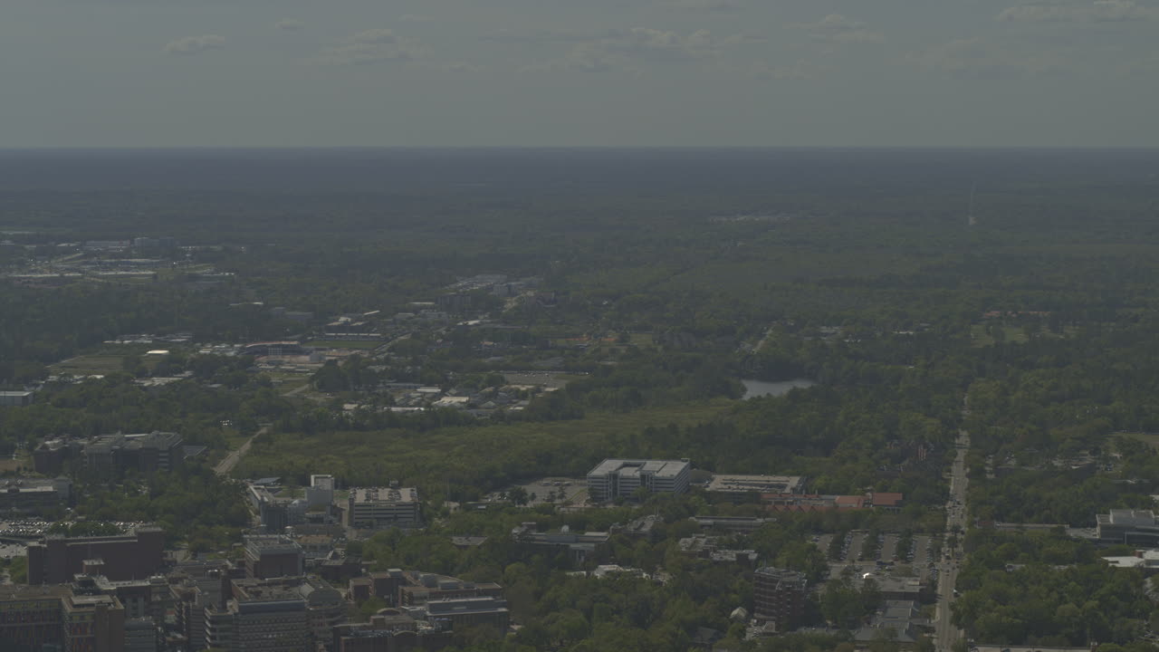 Gainesville Florida Aerial v10 pull out reveal of the landscape surrounding the university hospital and campus - DJI Inspire 2, X7, 6k - March 2020