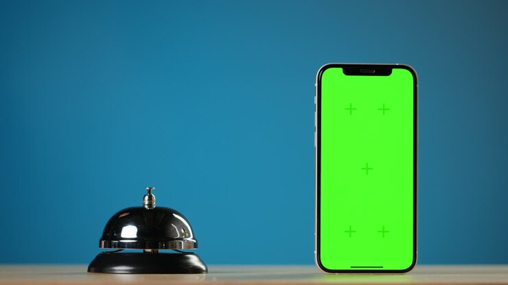 Hotel Reception with Green Screen Smartphone and Bell
