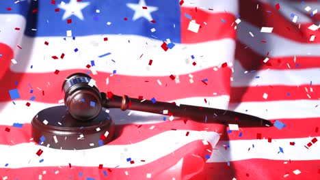 colorful confetti falling over gavel against us flag