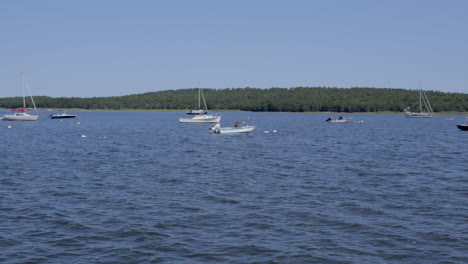 pan of boats on a lake in cape cod on a beautiful summer day