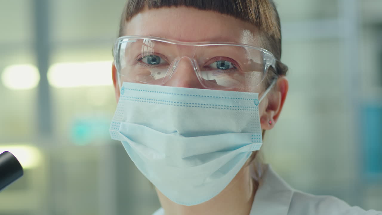 Portrait of Female Scientist in Mask and Glasses in Lab
