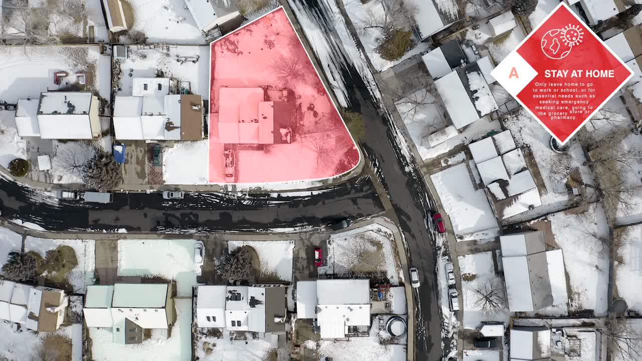 Aerial view displays Stay At Home Motion Graphic over hypothetical home quarantine.