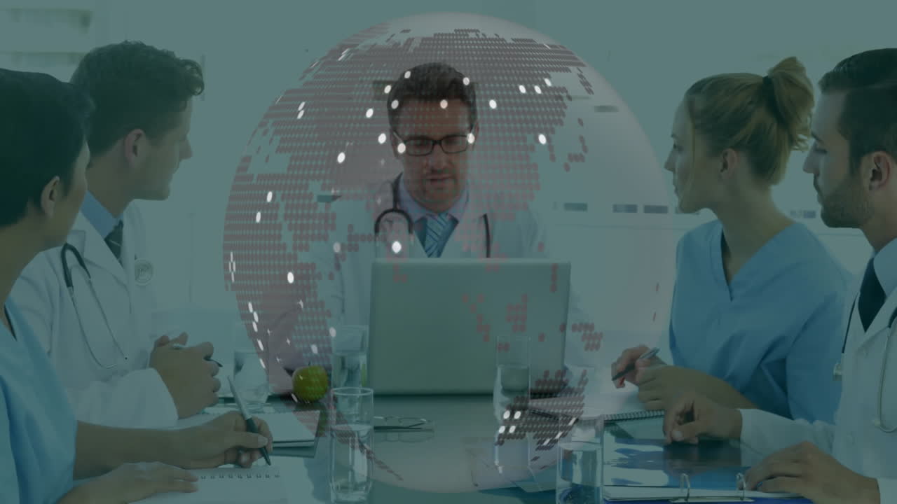 의료 전문가들이 그 위에 디지털 글로브 애니메이션을 가지고 만나고 있습니다.