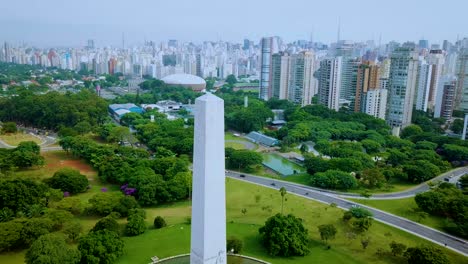 São-Paulo-city-centre-with-monument-and-skyline,-Brazil-aerial-shot