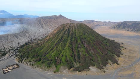 drone moves backward from batok old volcano in java indonesia