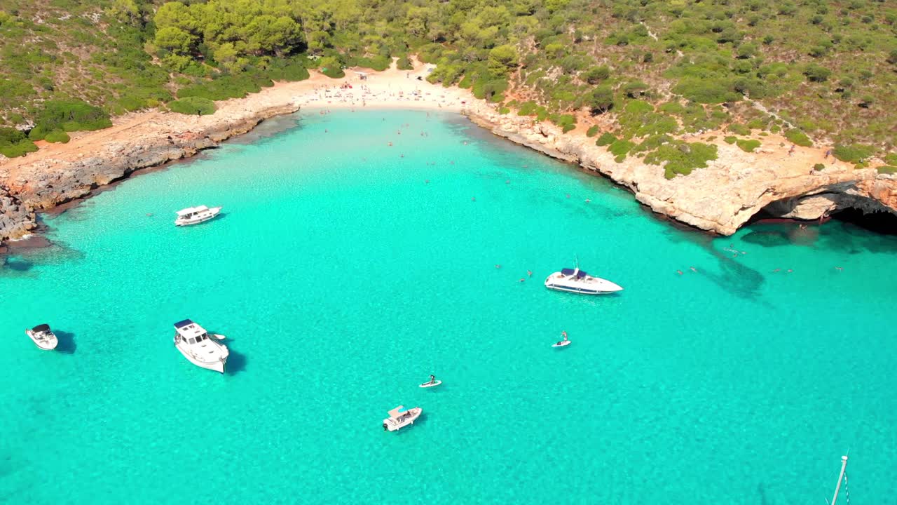 Aerial footage on Cala Varques beach, Mallorca. A hidden paradise with crystal clear water.